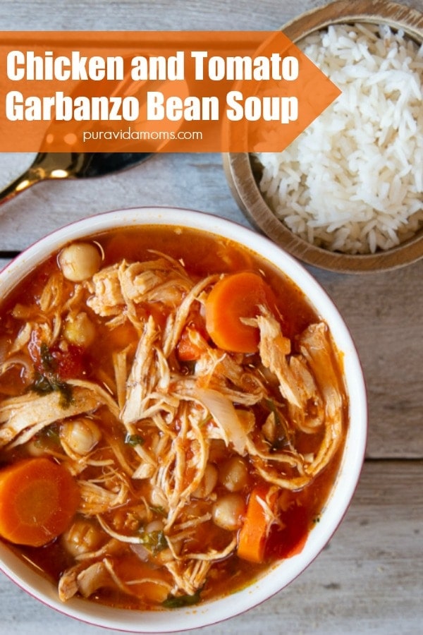 A bowl of chicken tomato soup.