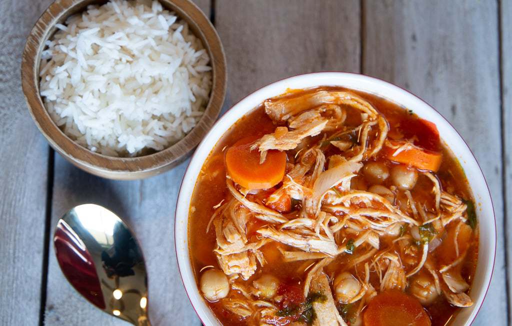Chicken soup with garbanzo beans, carrots and white rice.