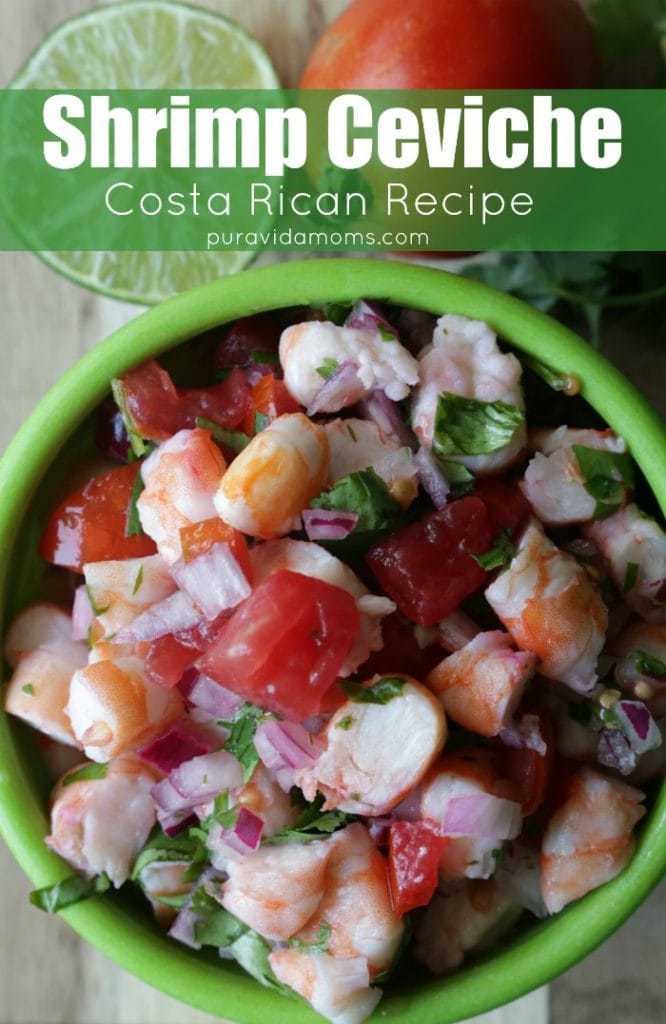 A green bowl of shrimp Ceviche.