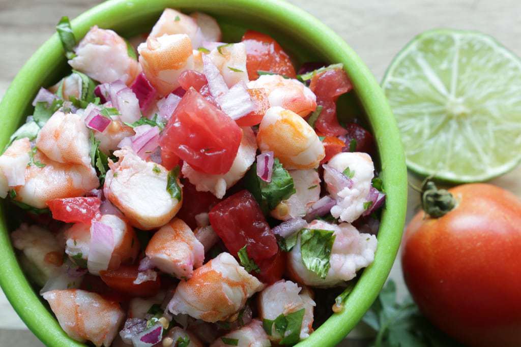 shrimp, lime, cilantro tomato on cutting board