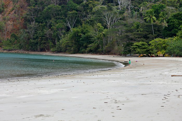 Looking for a quiet, off the beaten path beach just an 1 and 1/2 hours from San Jose, Playa Mantas Costa Rica is the place to go. Bathwater temperature, soft waves, and turquoise water- and did we mention few tourists? #costarica #familybeach #familytravel #costaricabeach #traveltips #puravida #puravidamoms #beachtips