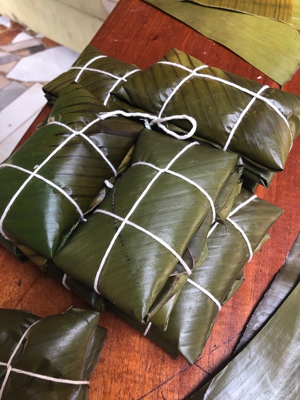 group of costa rican tamales on a wood table