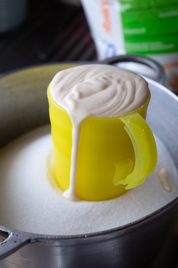 costa rican sour cream, natilla, in yellow cup