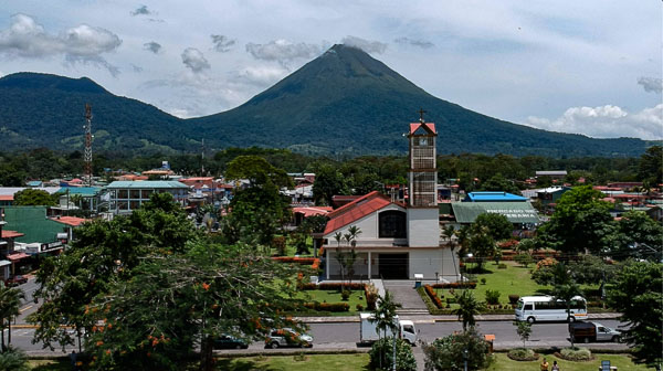 View of La Fortuna and Arenal volcano from the air.