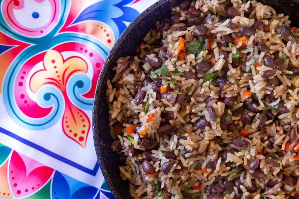 partical close up of homemade costa rican gallo pinto and colorful table decor