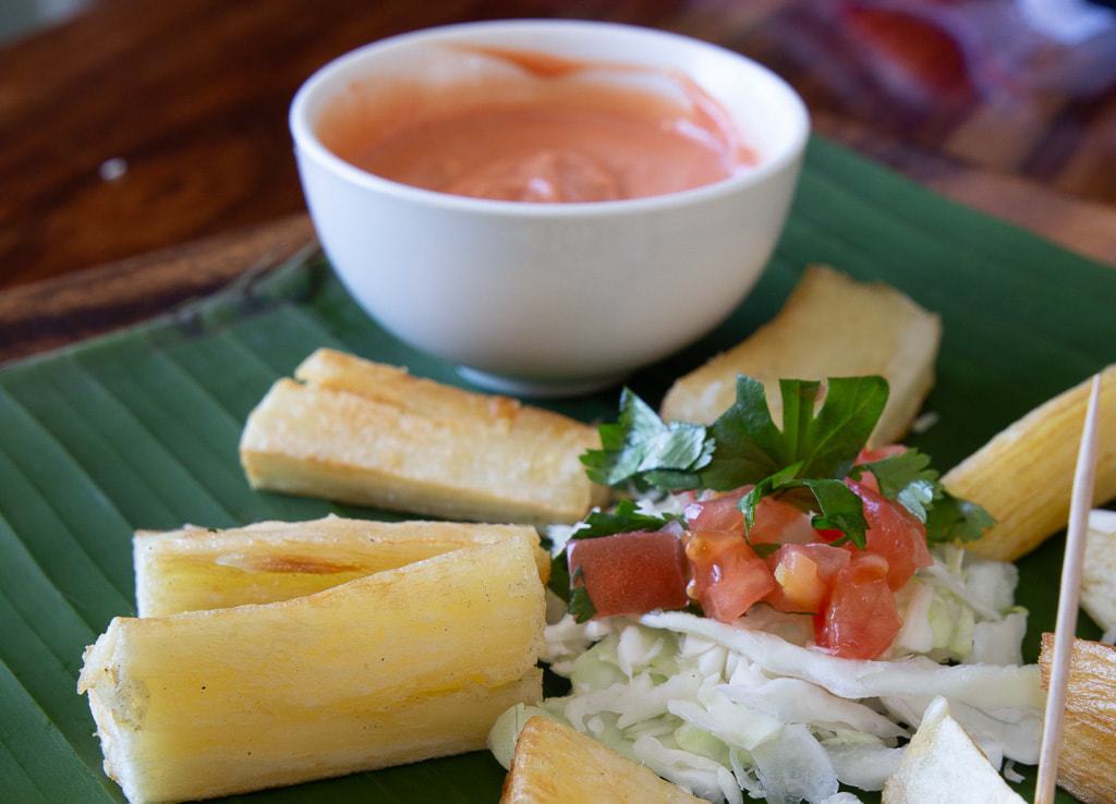 plate of yuca fries with salad and dipping sauce costa rica