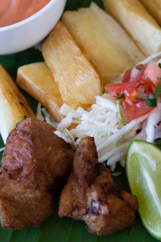 Chicharron de cerdo Costa Rica with yuca fries and lime.