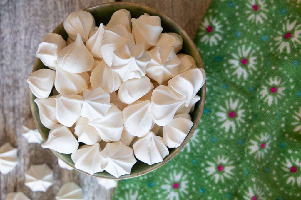 bowl of small white meringue cookies