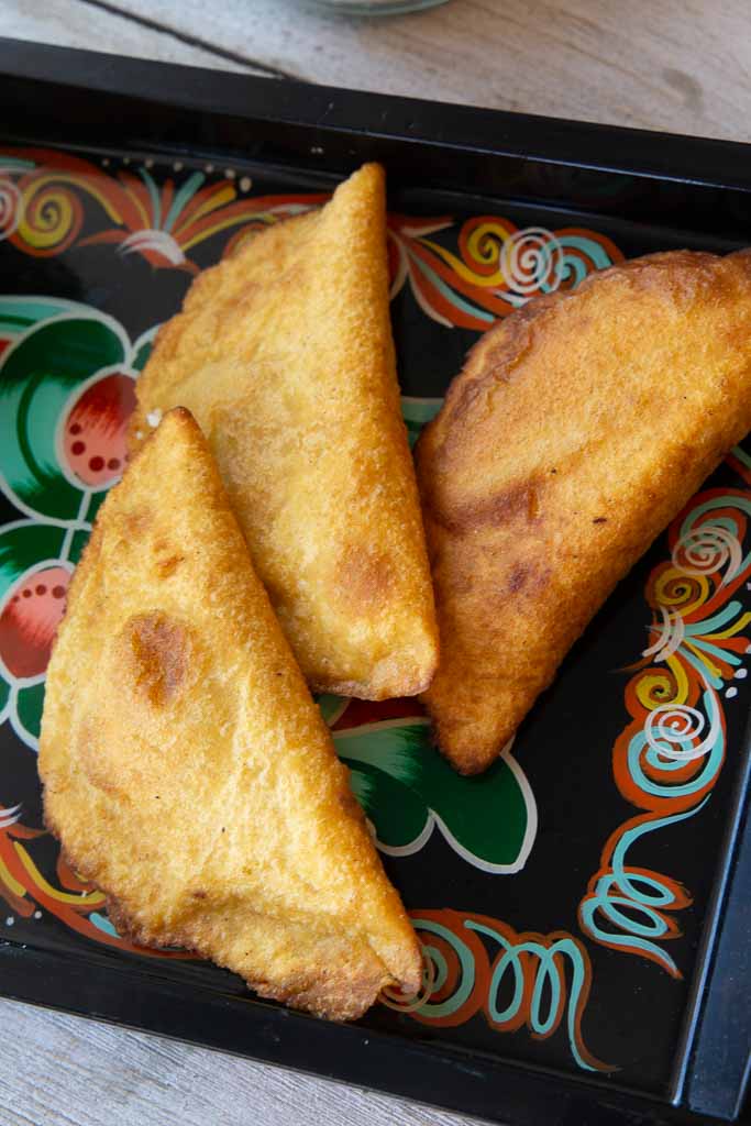 Trio of fresh Costa Rican bean and cheese empanadas.