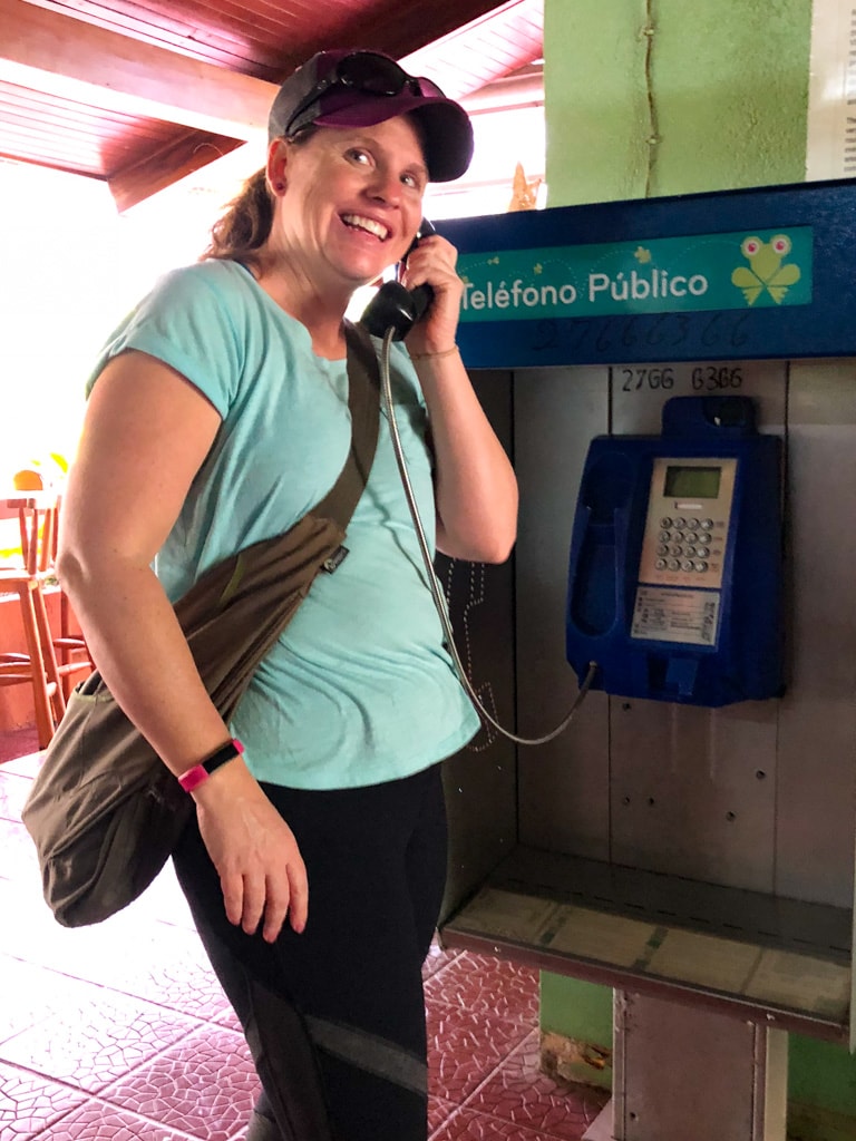 lady by pay phone