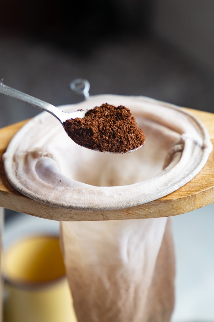 placing coffee in a coffee sock